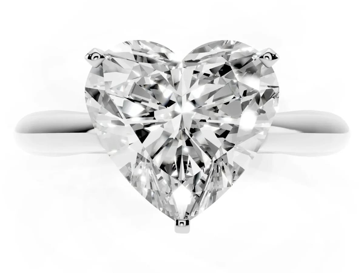 Heart Cut Diamond Solitaire Engagement Ring with Cathedral Setting and Four-Prong Mount Platinum