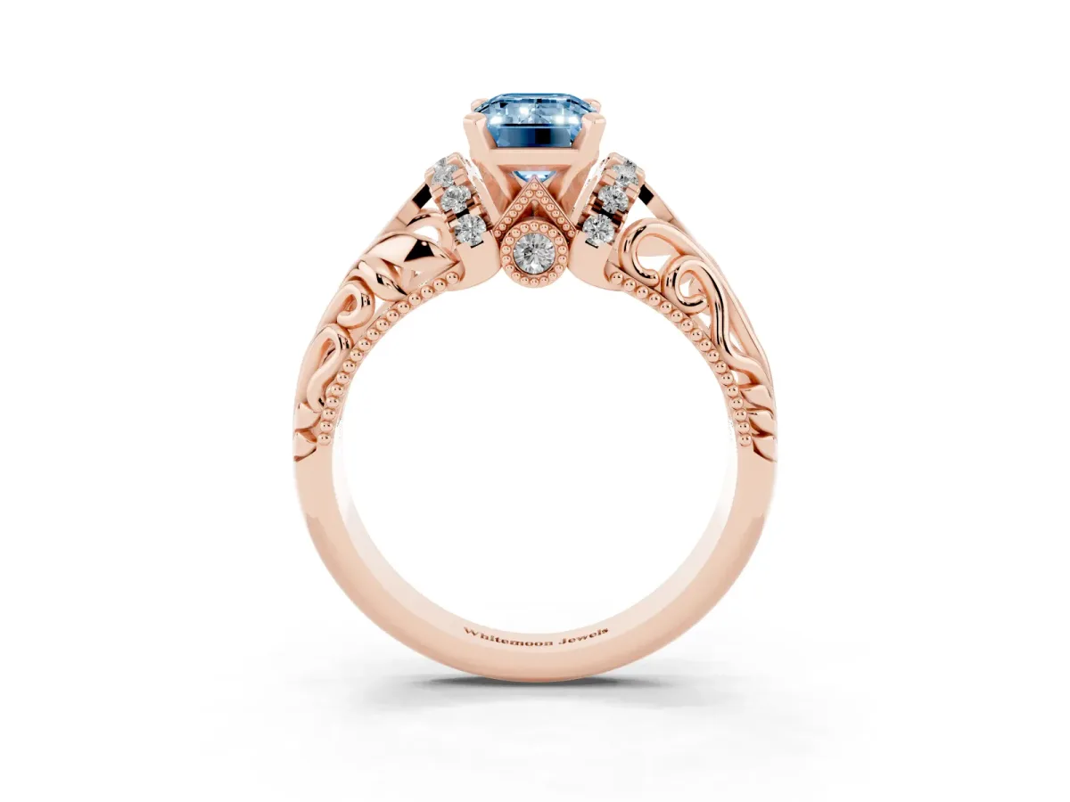 Fancy Blue Emerald Cut Solitaire Filigree Engagement Ring with Halo and Prong Setting Rose gold