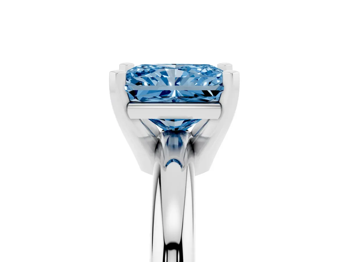 Fancy Blue Radiant Cut Diamond Solitaire Engagement Ring with Round Band and Four-Prong Setting Platinum
