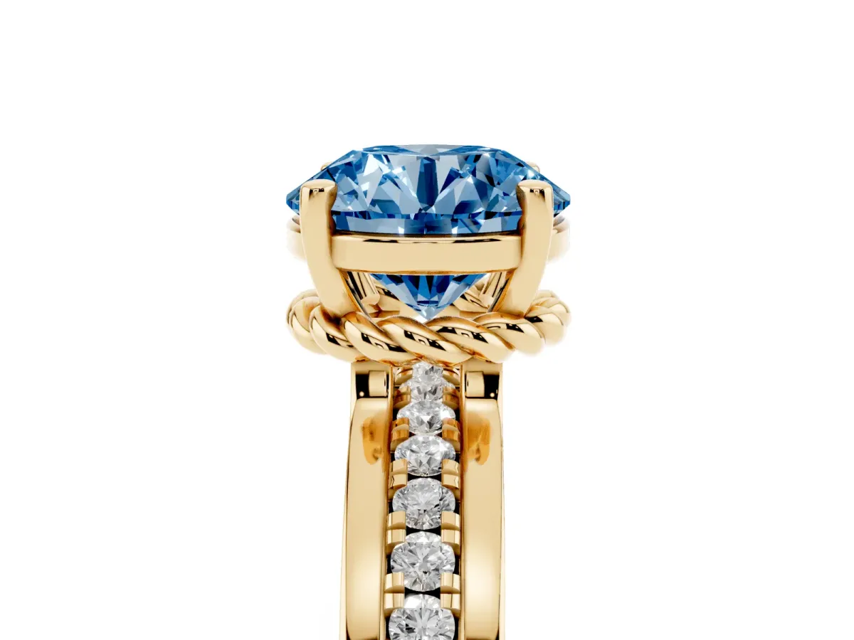 Fancy Blue Round Cut Solitaire Diamond Ring with Channel Set Band and Six-Prong Setting Yellow gold