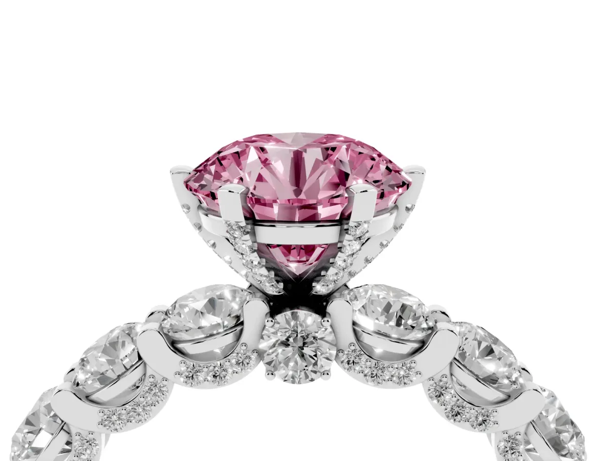 Fancy Pink Round Cut Diamond Side Stone Engagement Ring with Four-Prong Setting Silver
