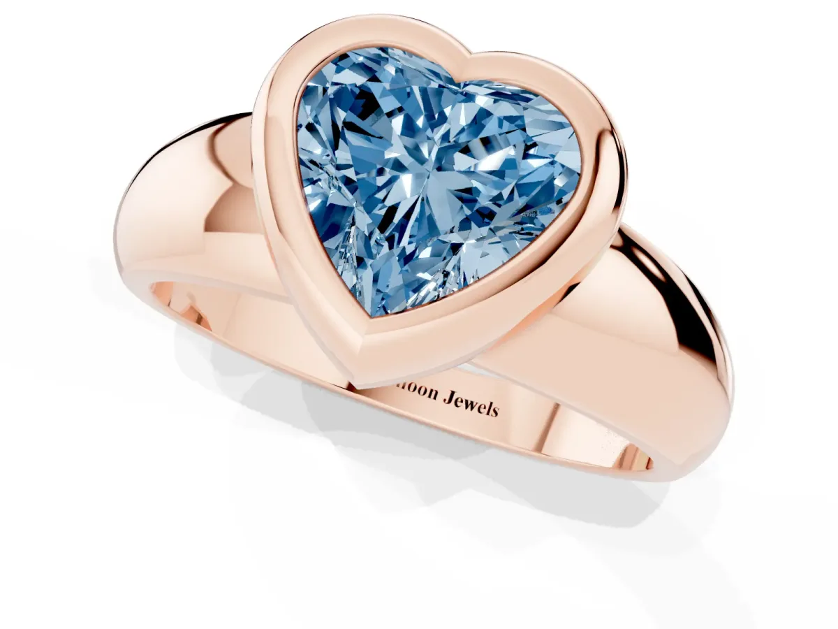 Fancy Blue Bezel Set Heart Cut Solitaire Ring with Wide Band Rose gold