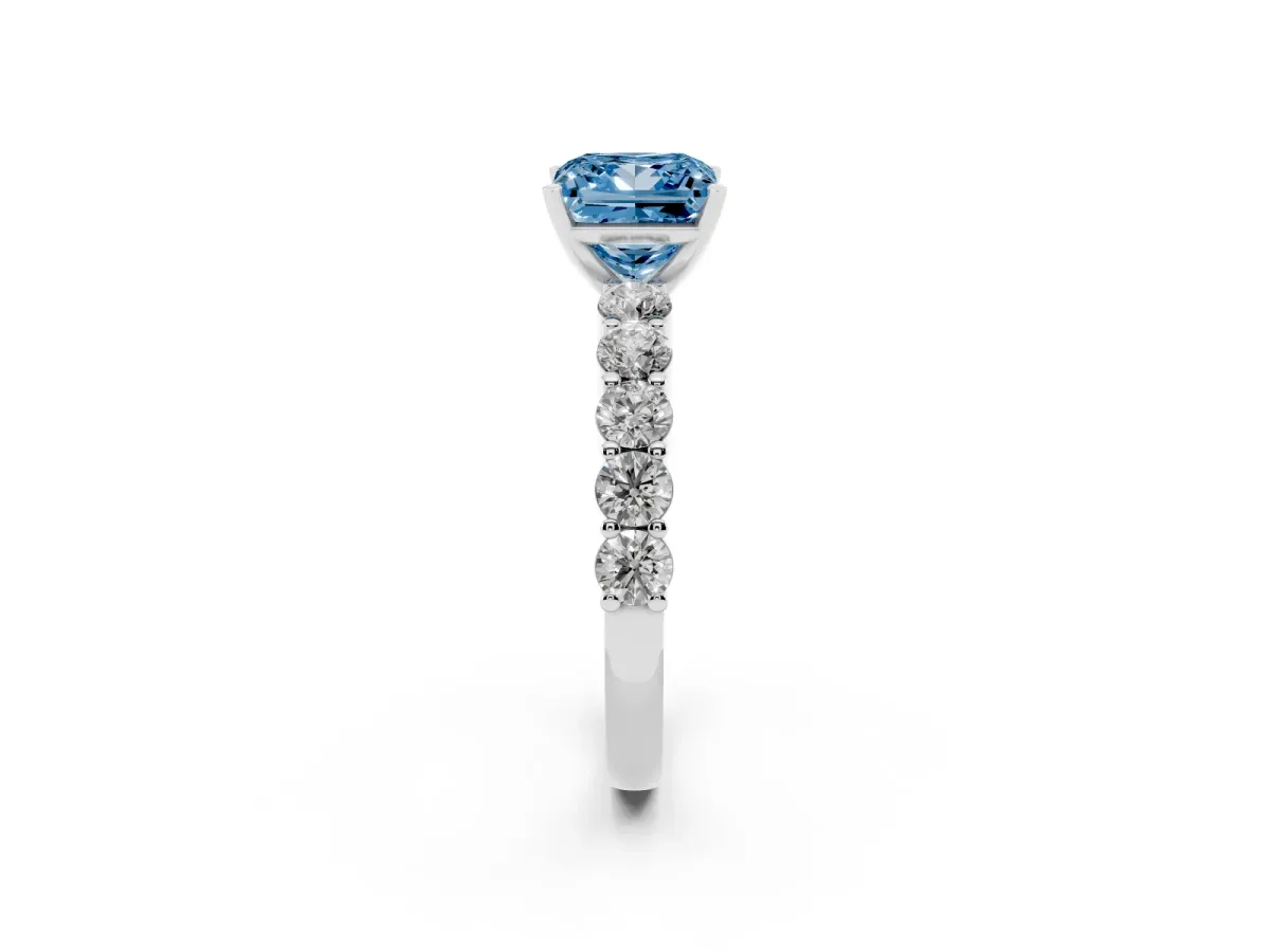 Fancy Blue Princess Cut Diamond Solitaire Ring with Shared Prong Round Side Stones Platinum