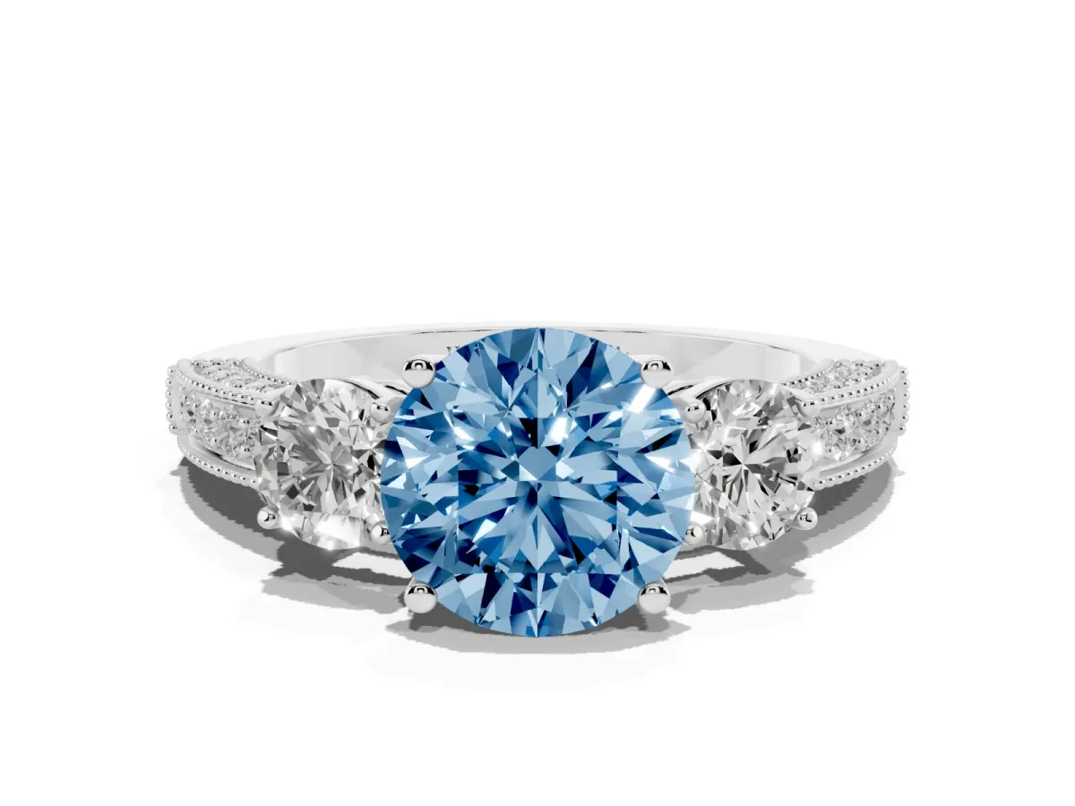 Fancy Blue Round Cut Three-Stone Diamond Ring with Pavé Band and Four-Prong Setting Silver