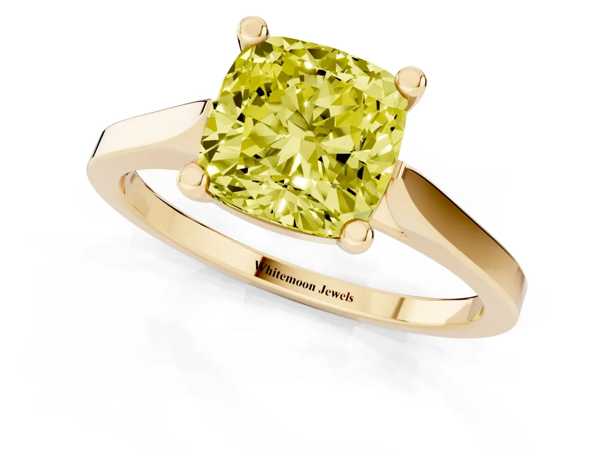 Fancy Yellow Cushion Cut Solitaire Diamond Ring with Four-Prong Setting and Tapered Band Yellow gold