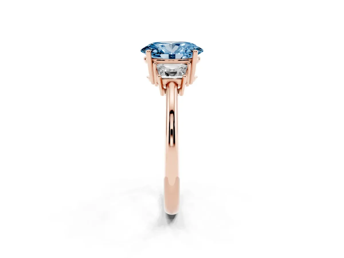 Fancy Blue Oval Cut Diamond Three-Stone Ring with Trapezoid Side Stones and Prong Setting Rose gold