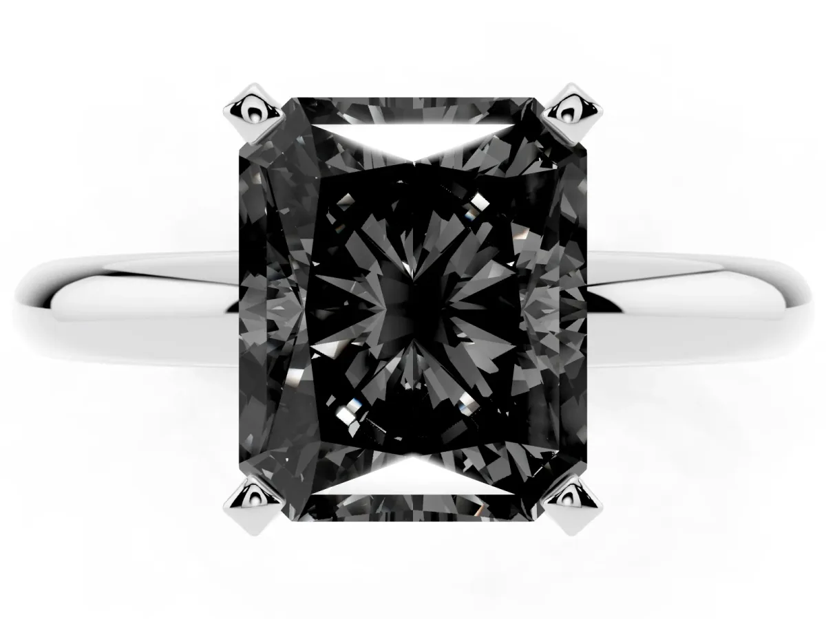 Fancy Black Radiant Cut Diamond Solitaire Engagement Ring with Round Band and Four-Prong Setting Silver