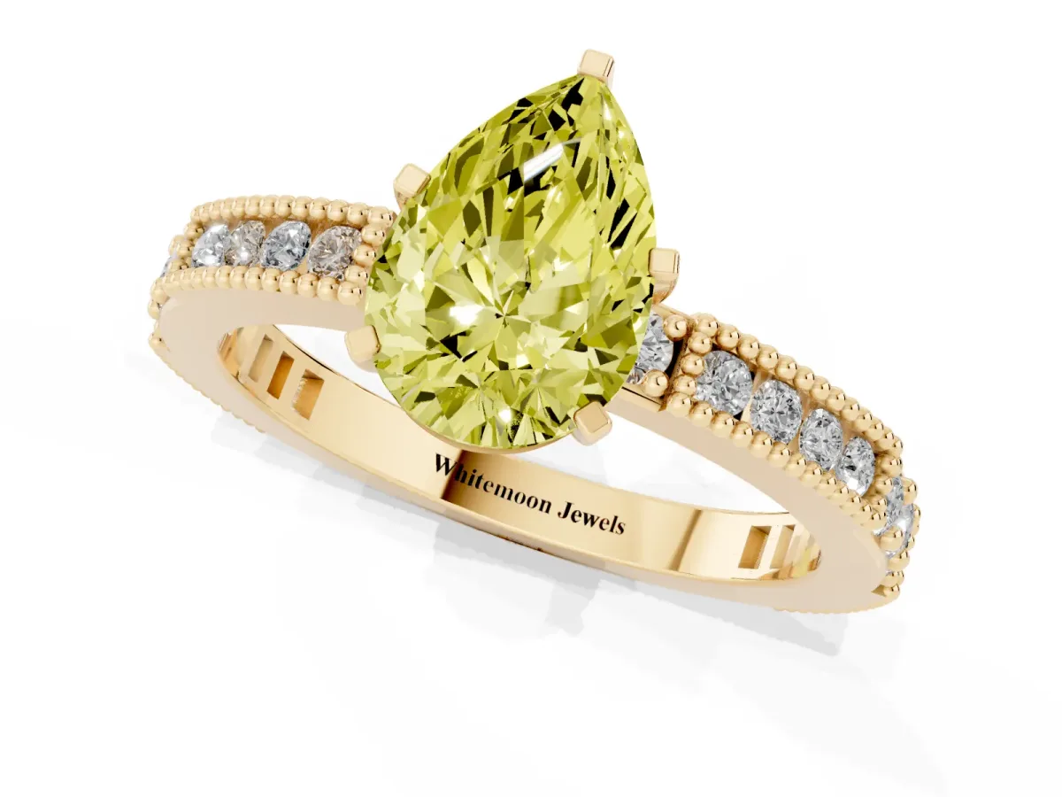 Fancy Yellow Pear Cut Solitaire with Pavé Band and Four-Prong Setting Yellow gold