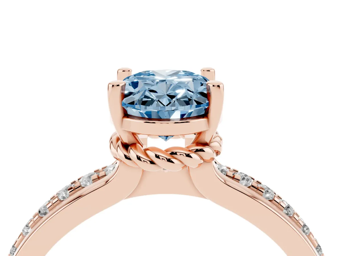 Fancy Blue Oval Cut Solitaire Diamond Ring with Channel Set Band and Six-Prong Setting Rose gold