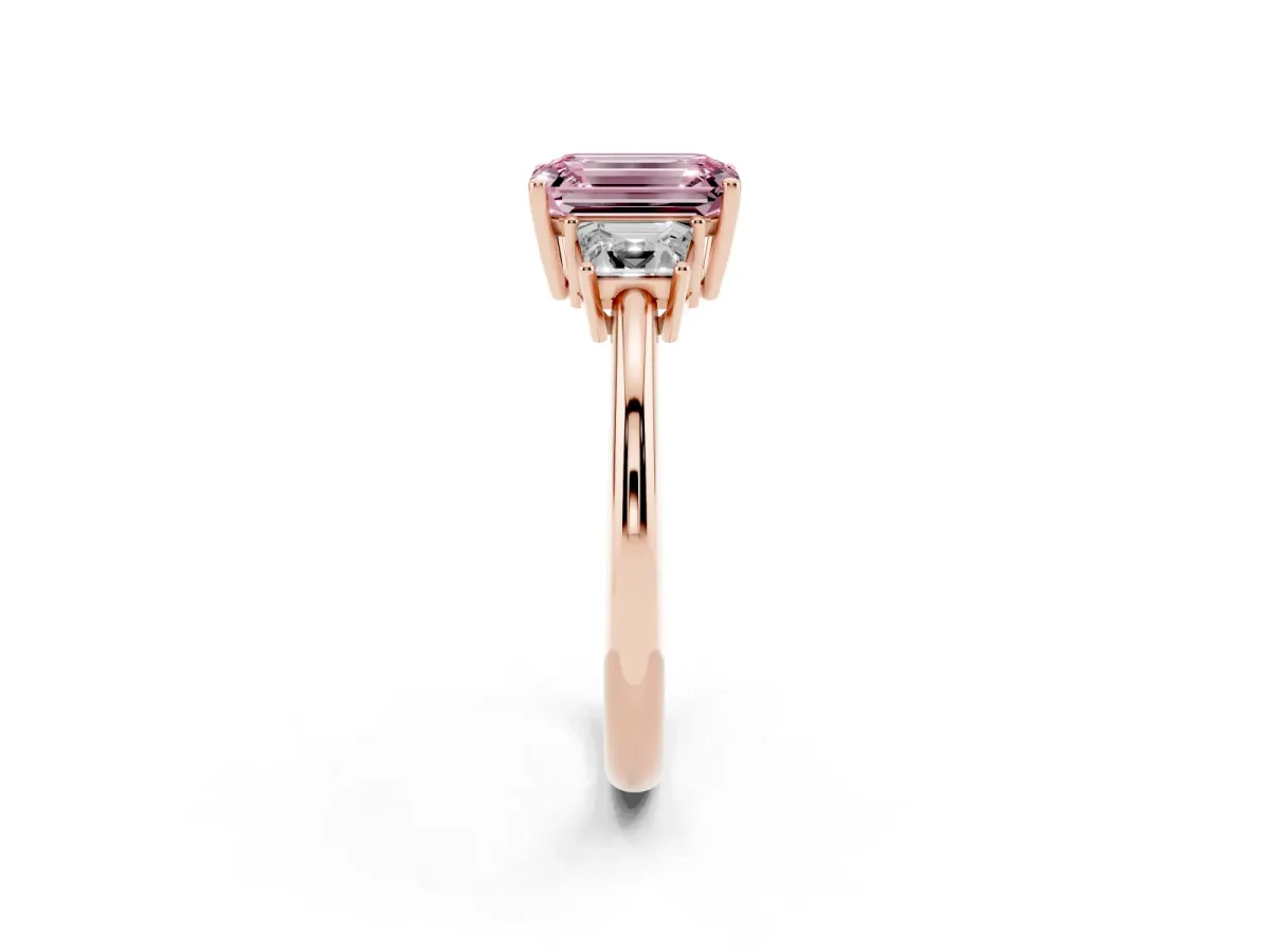 Fancy Pink Emerald Cut Diamond Three-Stone Ring with Trapezoid Side Stones and Prong Setting Rose gold