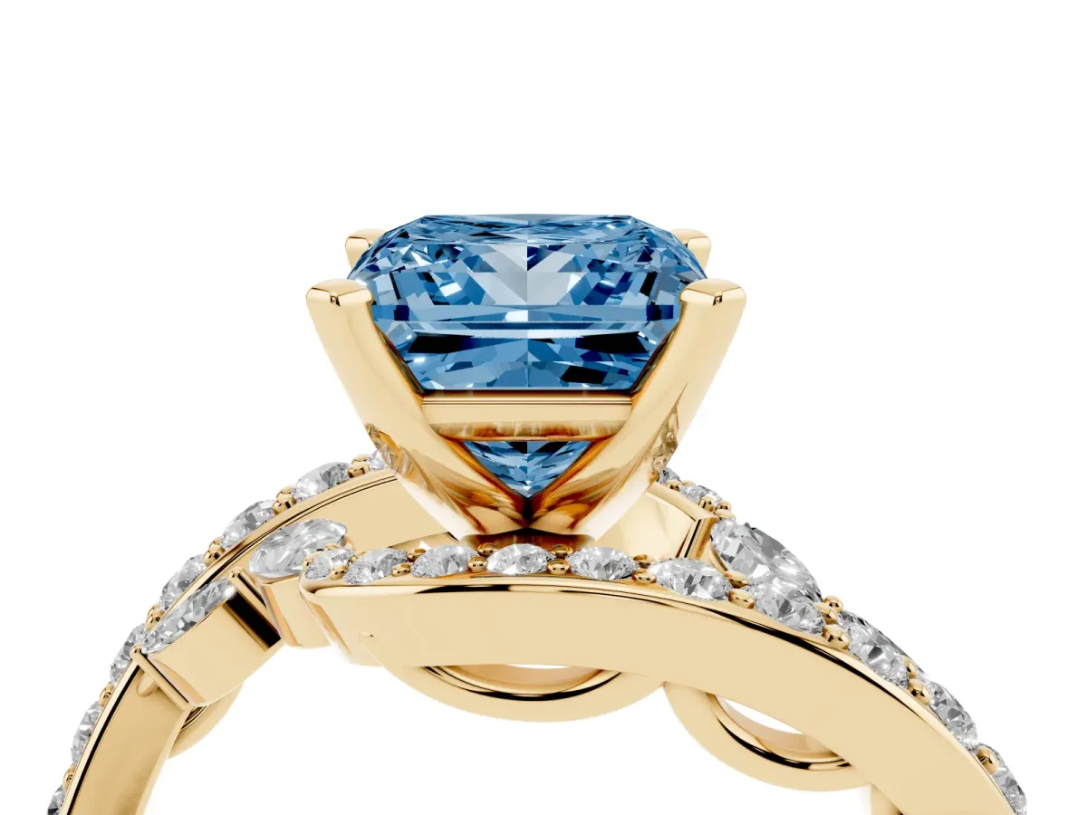 Fancy Blue Princess Cut Solitaire with Pavé Twist Band and Four-Prong Setting Yellow gold
