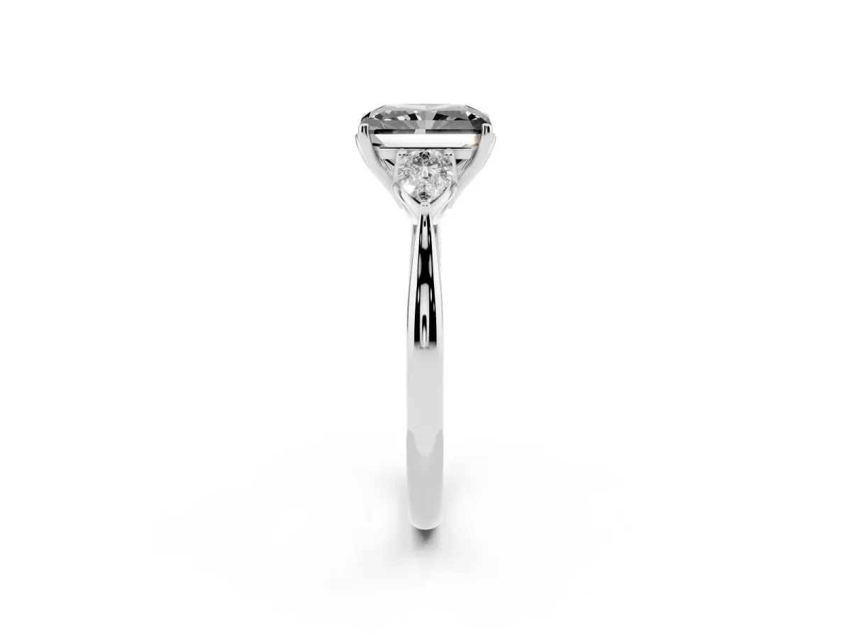 Fancy Black Radiant Cut Diamond Three-Stone Ring with Pear Side Stones and Prong Setting Platinum