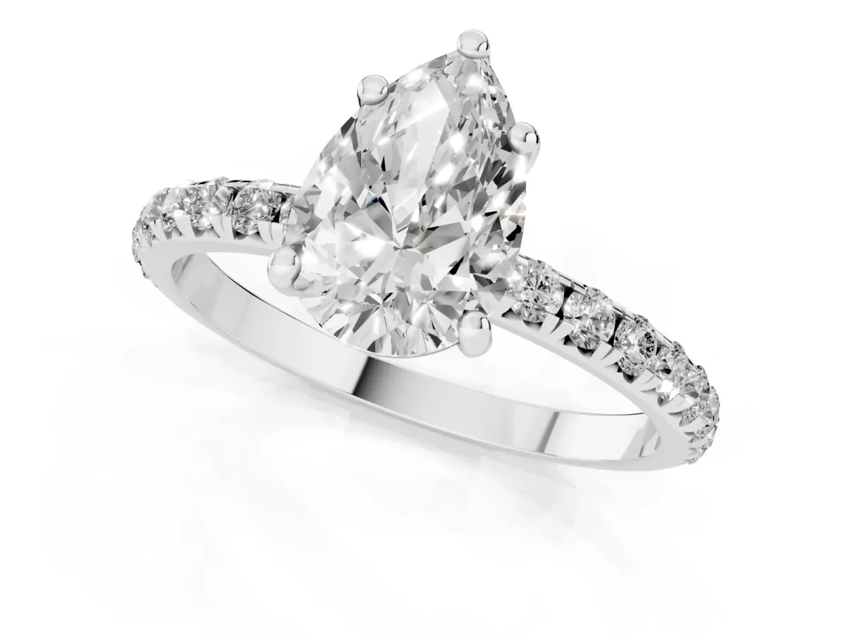 Pear Cut Cut Diamond Solitaire Ring with Micro Pave Band and Four Prong Setting Silver