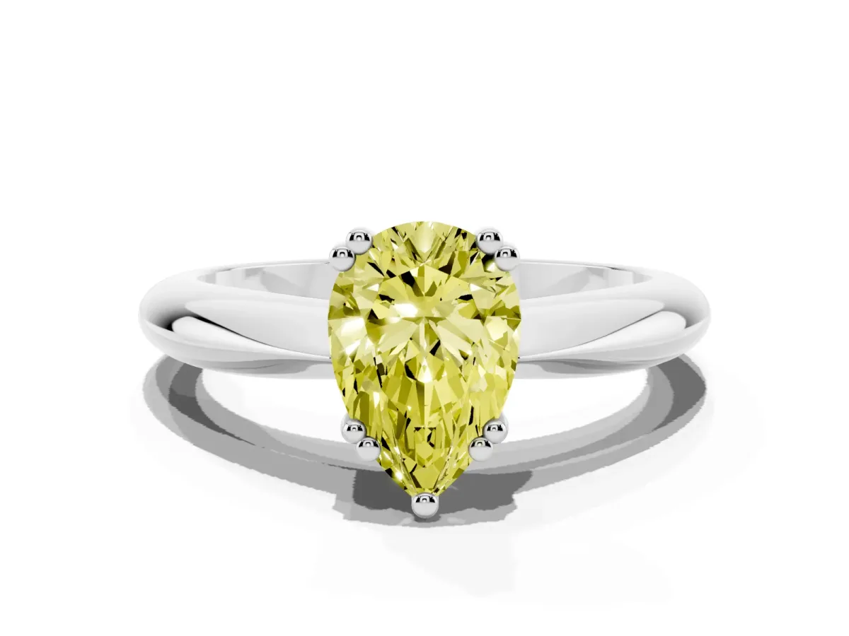 Fancy Yellow Pear Cut Cut Solitaire Engagement Ring with Tapered Band and Four-Prong Setting Silver