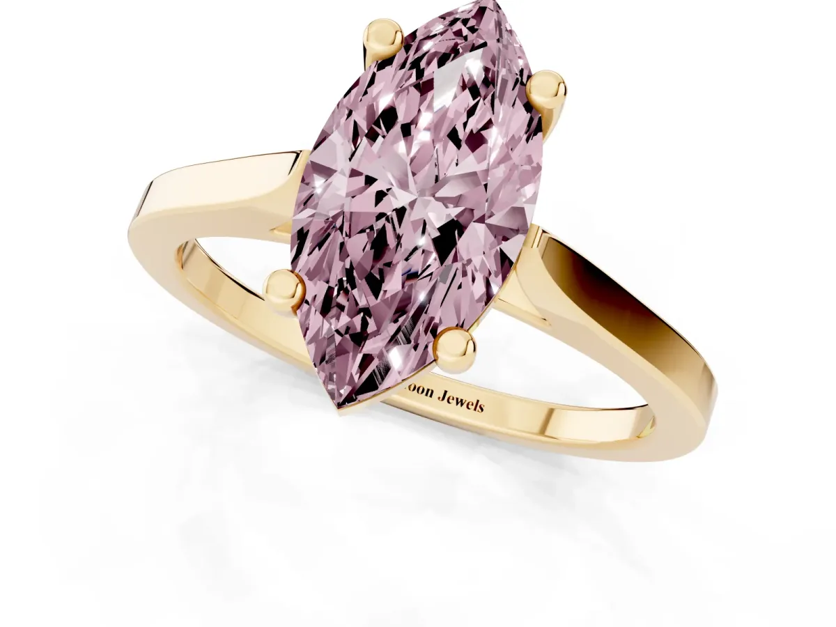 Fancy Pink Marquise Cut Solitaire Diamond Ring with Four-Prong Setting and Tapered Band Yellow gold
