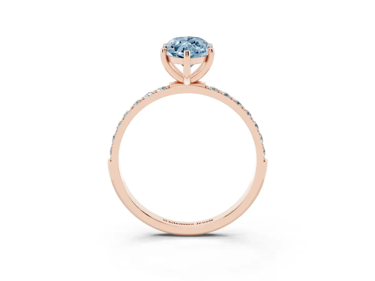 Fancy Blue Marquise Cut Diamond Solitaire Ring with Round Pavé Shoulders and Prong Setting Rose gold