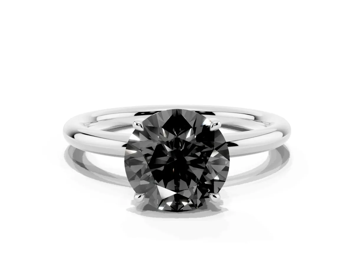 Fancy Black Round Cut Diamond Solitaire Ring with Thin Band and Four-Prong Setting Platinum