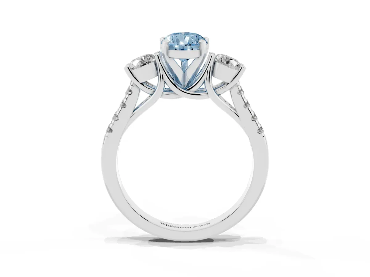 Fancy Blue Three-Stone Pear Cut Diamond Pavé Band with Four-Prong Setting Platinum