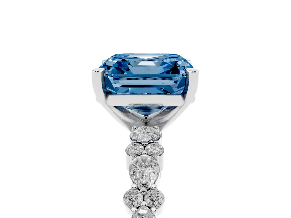 Fancy Blue Asscher Cut Diamond Side Stone Solitaire Ring with Round and Four-Prong Setting Platinum