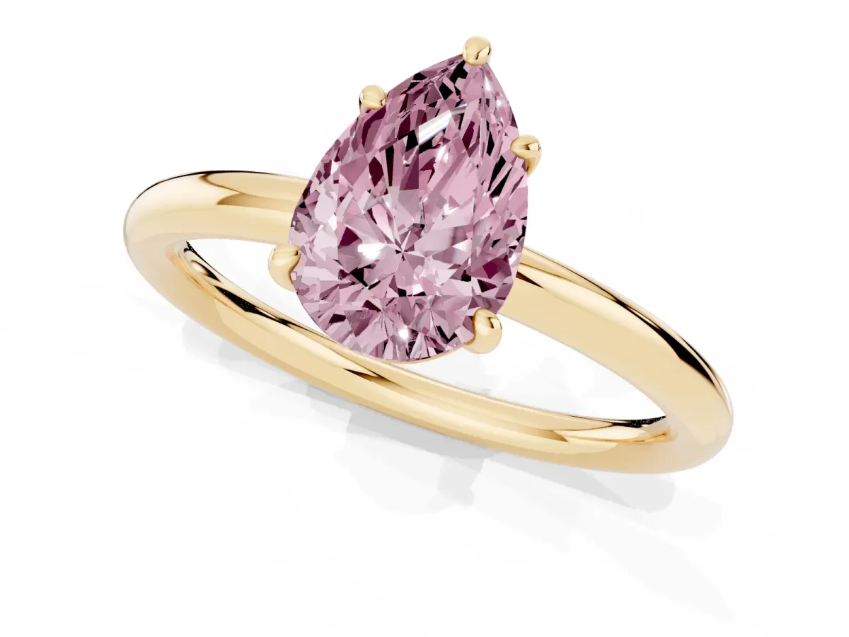 Fancy Pink Pear Cut Solitaire Diamond Ring with Four-Prong Setting on a Plain Band Yellow gold