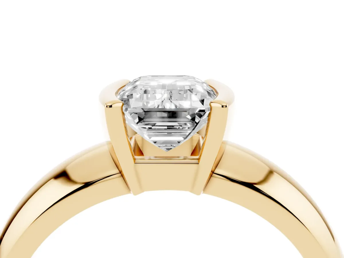 Emerald Cut Solitaire Tension Set Diamond Ring with Wide Band Yellow gold