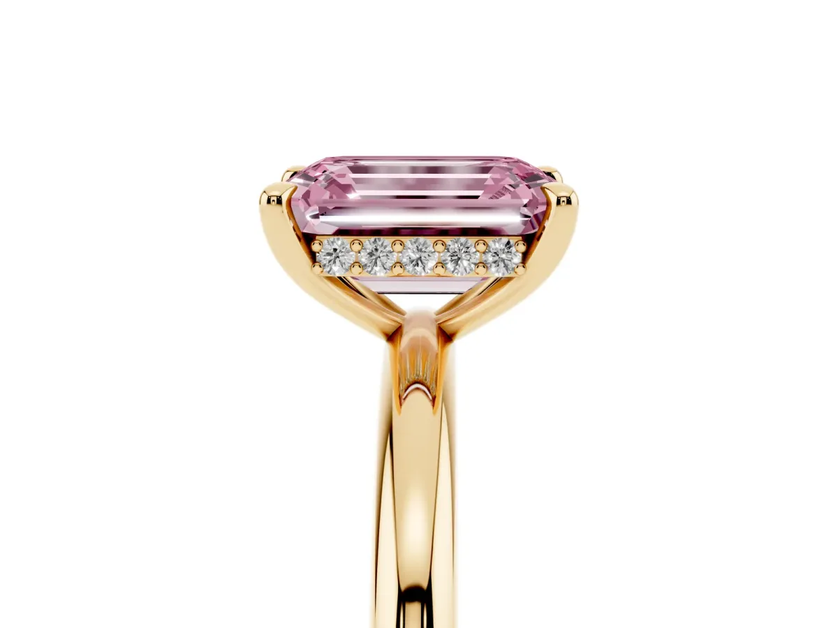 Fancy Pink Emerald Cut Diamond Solitaire Ring with Thin Band and Four-Prong Setting Yellow gold