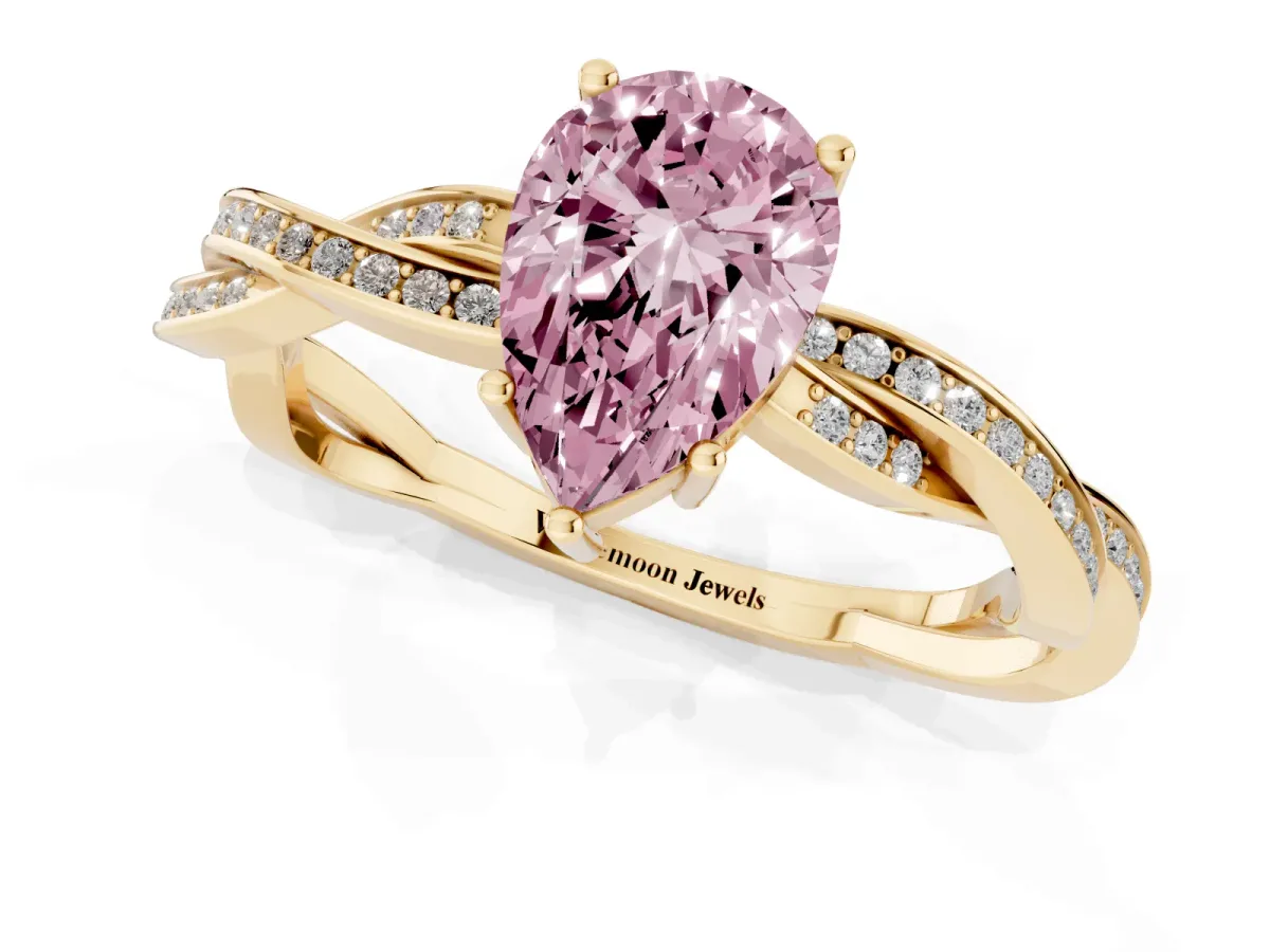 Fancy Pink Pear Cut Solitaire Twisted Pave Diamond Ring with Four-Prong Setting Yellow gold