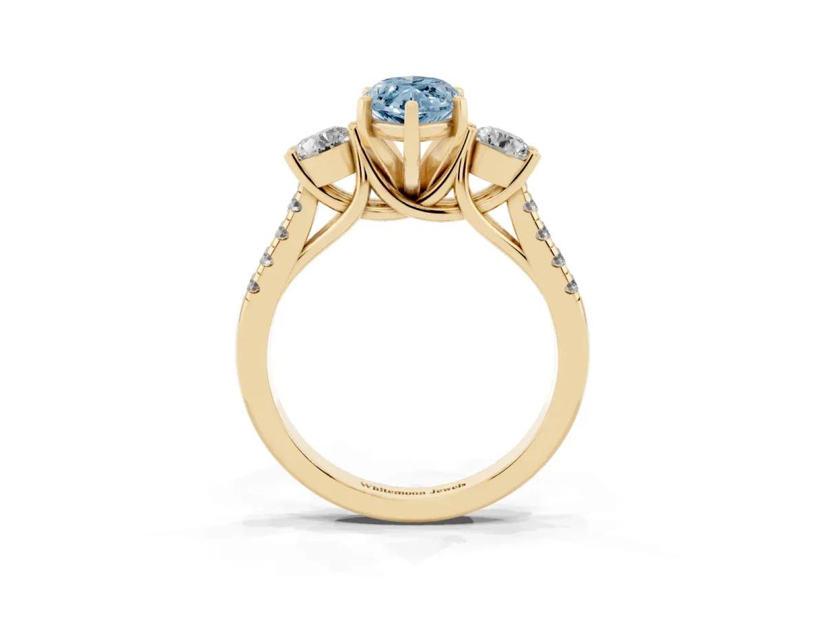 Fancy Blue Three-Stone Marquise Cut Diamond Pavé Band with Four-Prong Setting Yellow gold