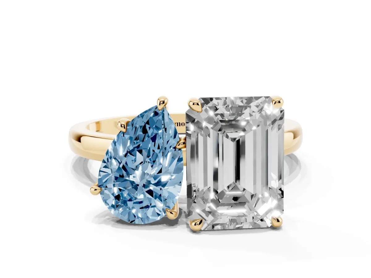 Fancy Blue Pear Cut and Emerald Cut Toi Moi Ring with Prong Setting Yellow gold