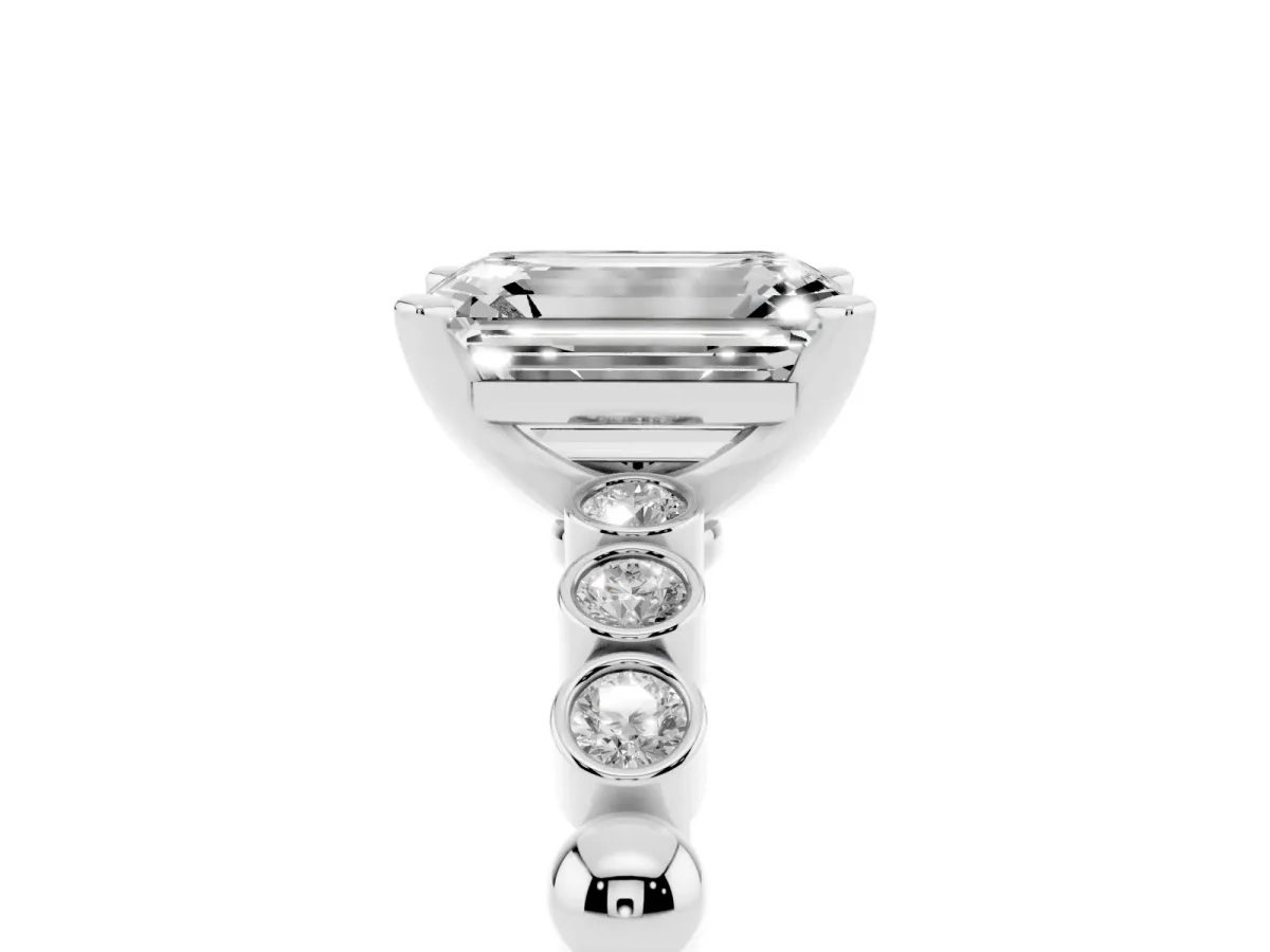 Emerald Cut Solitaire Bezel Accent Diamond Engagement Ring with Beaded Band and Four-Prong Setting Silver