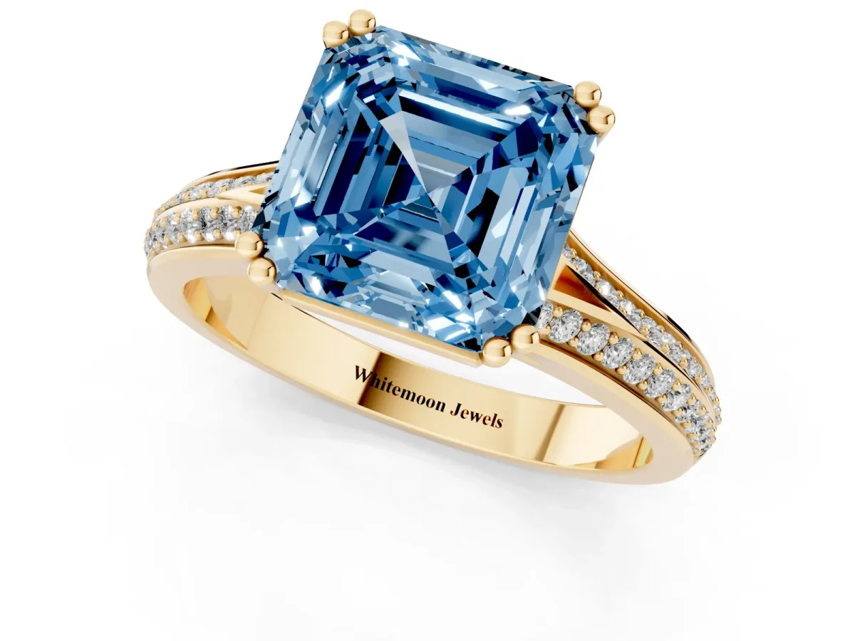 Fancy Blue Asscher Cut Diamond Split Shank Engagement Ring with Pavé Band Yellow gold