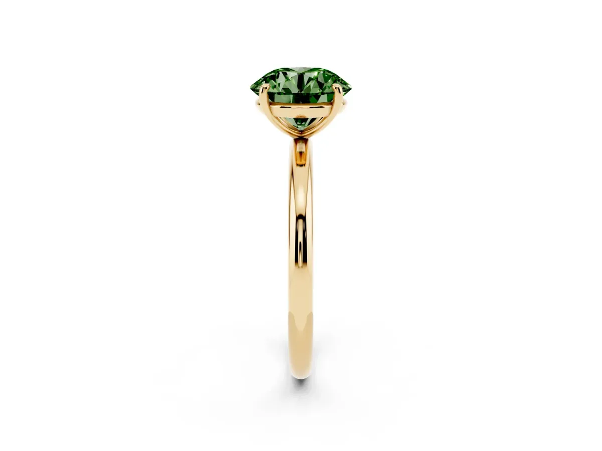 Fancy Green Round Cut Solitaire Diamond Ring with Four-Prong Setting on a Plain Band Yellow gold