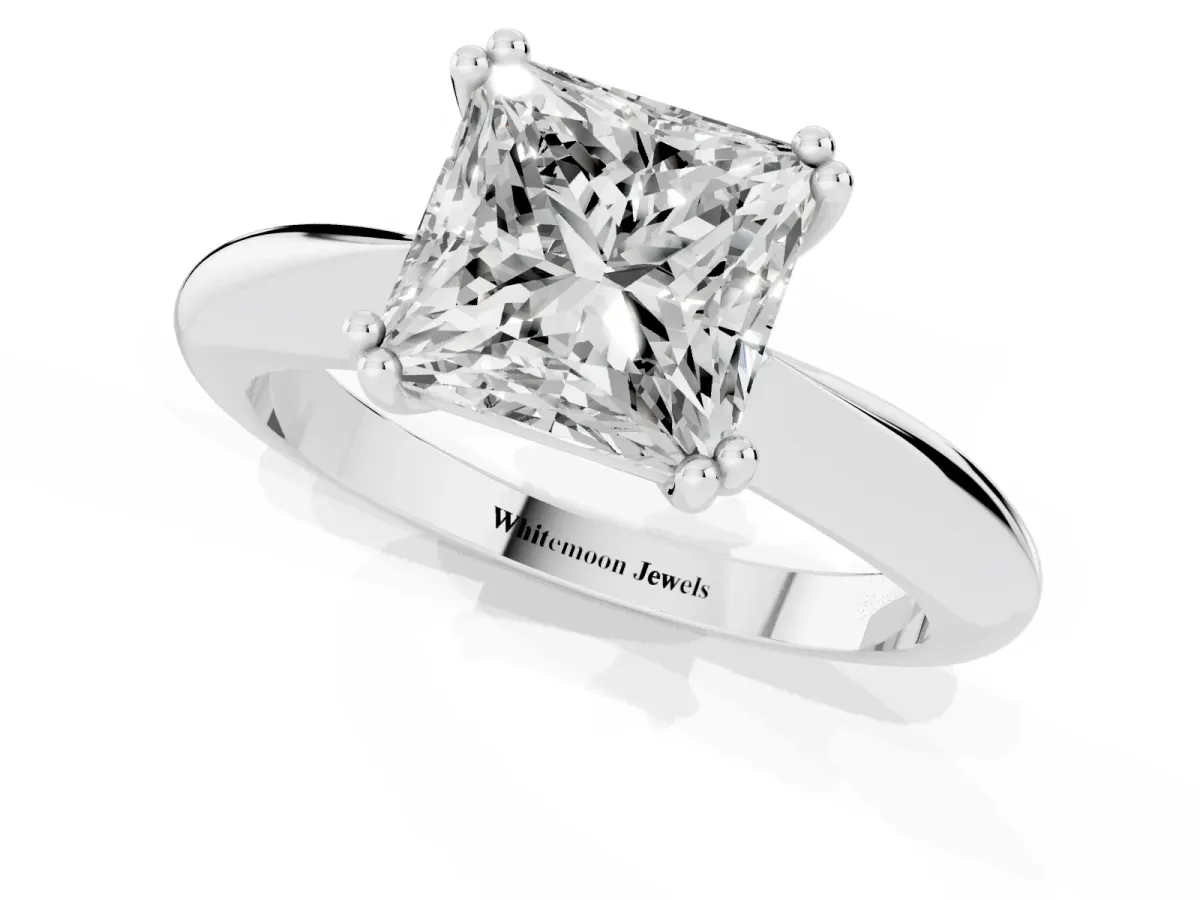 Princess Cut Cut Solitaire Engagement Ring with Tapered Band and Four-Prong Setting Platinum