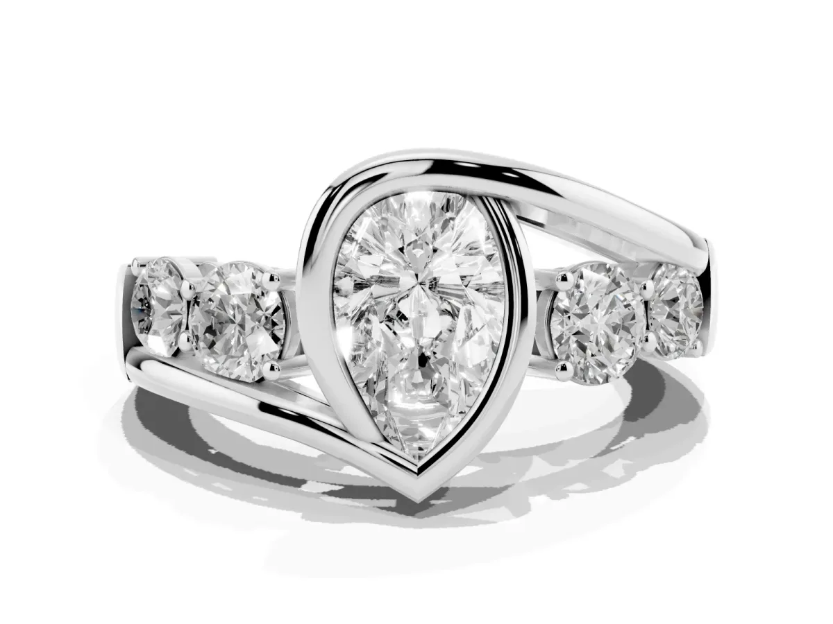 Bezel Set Pear Cut Diamond Bypass Ring with Round Accents Silver