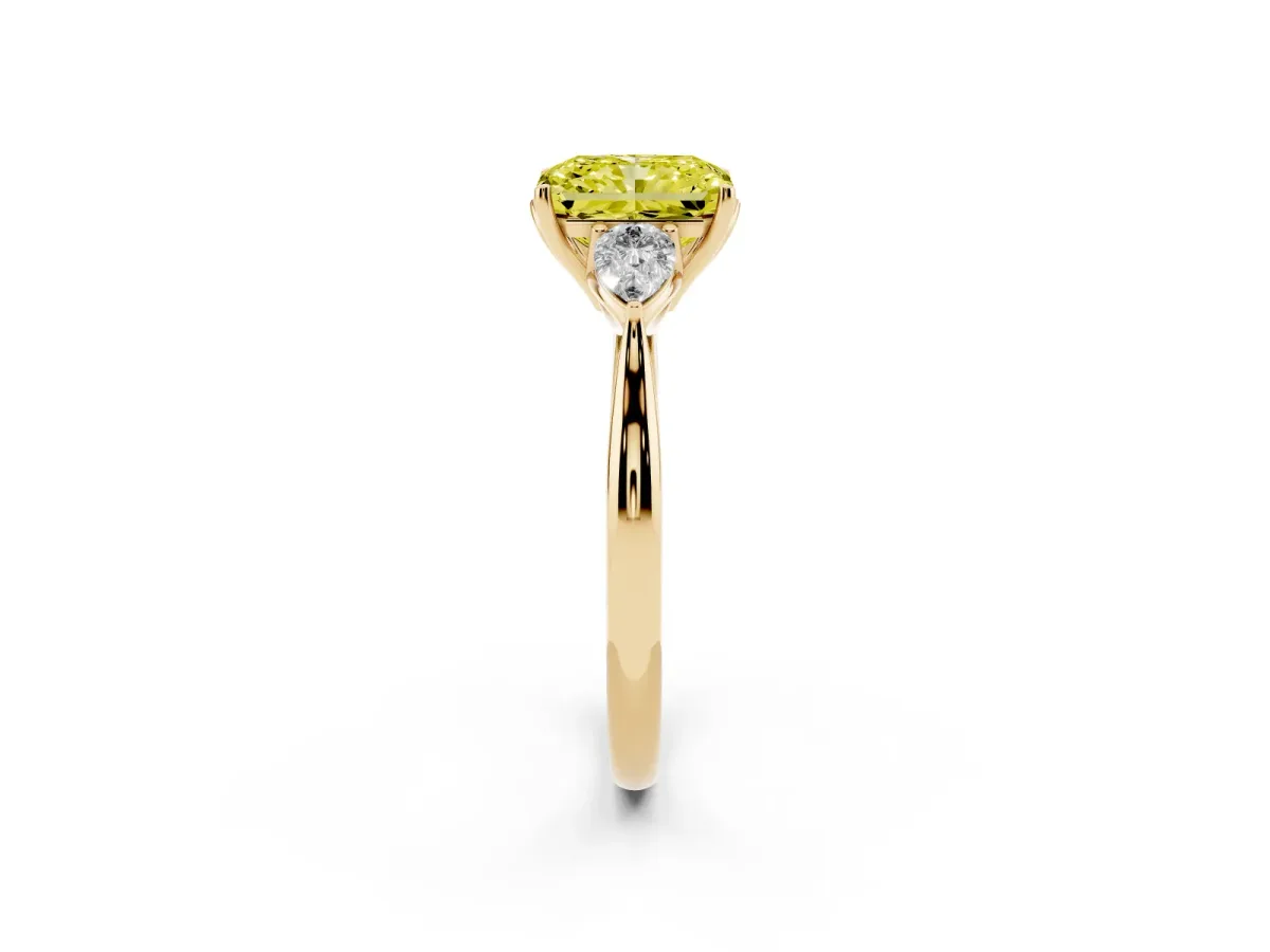 Fancy Yellow Radiant Cut Diamond Three-Stone Ring with Pear Side Stones and Prong Setting Yellow gold