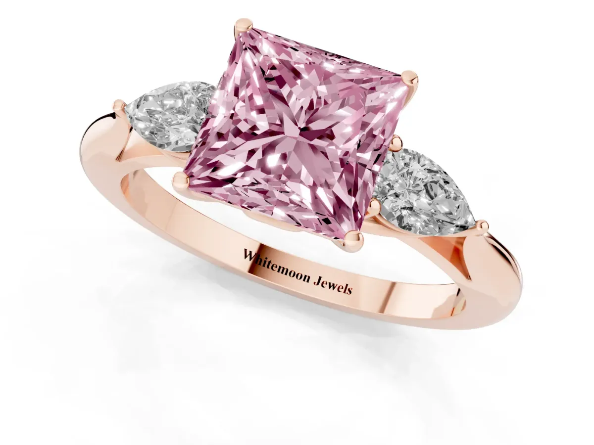 Fancy Pink Three-Stone Princess Cut Diamond Ring with Pear Side Stones in Four-Prong Setting Rose gold