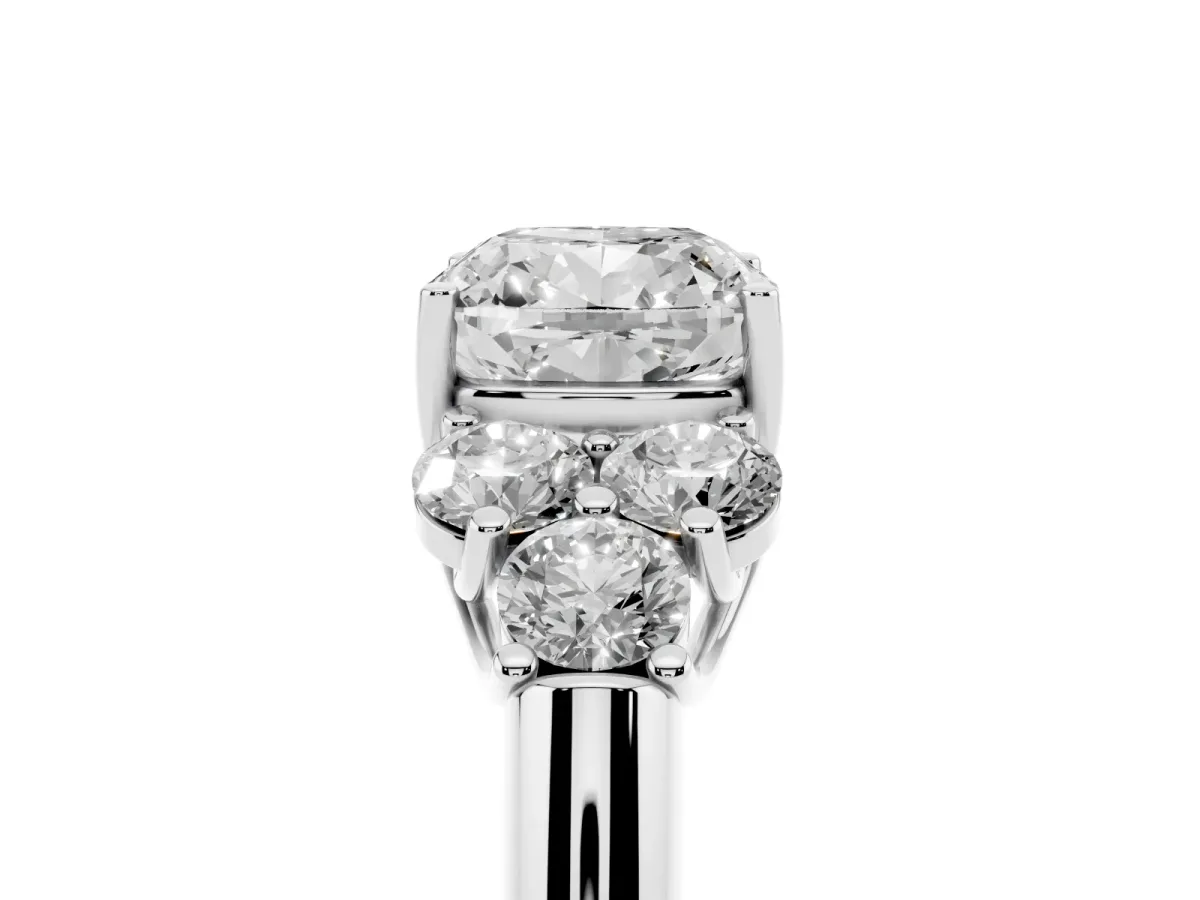 Cushion Cut Cut Diamond Cluster Ring with Round Accent Stones and Prong Setting on a Classic Band Silver