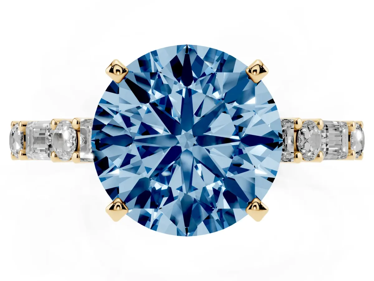 Fancy Blue Round Cut Diamond Solitaire with Side Baguettes and Channel Set Band Yellow gold