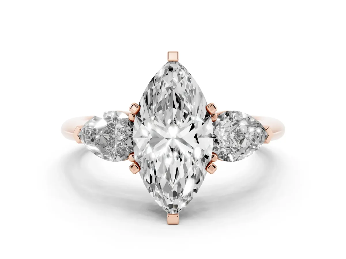 Three-Stone Marquise Cut Diamond Ring with Pear Side Stones and Four-Prong Setting Rose gold