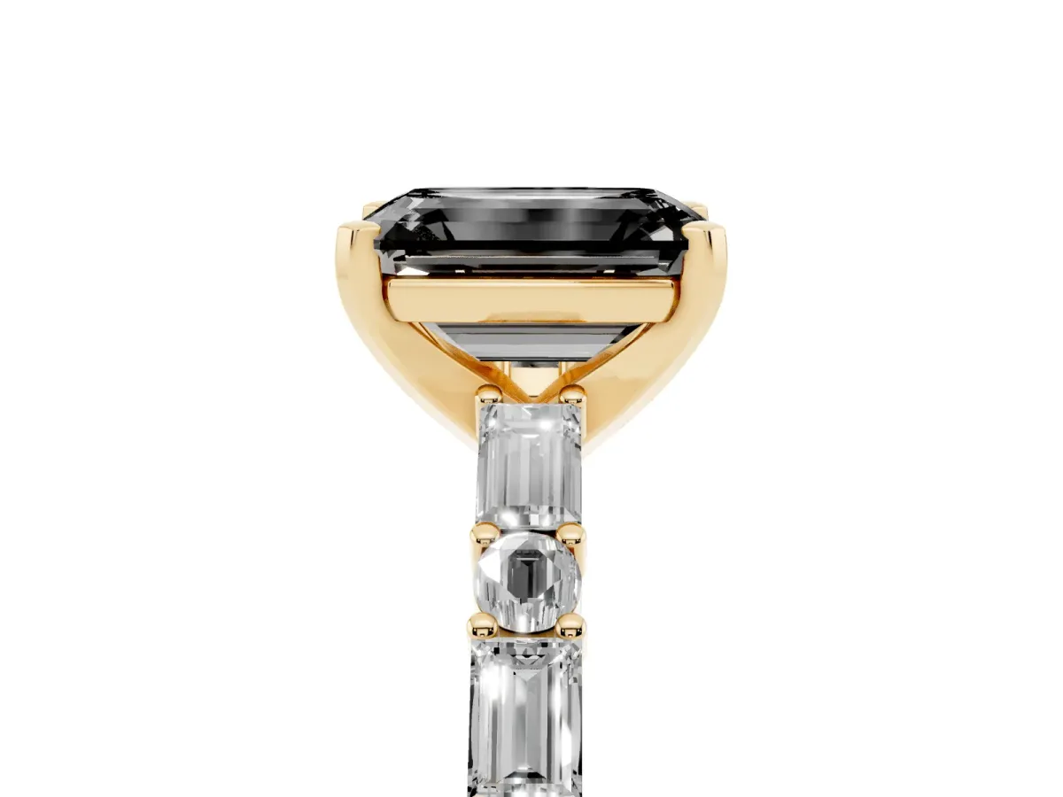 Fancy Black Emerald Cut Diamond Solitaire with Side Baguettes and Channel Set Band Yellow gold