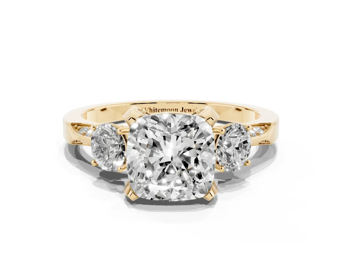 Cushion Cut Brilliant Three-Stone Diamond Ring with Pavé Band and Four-Prong Setting Yellow gold
