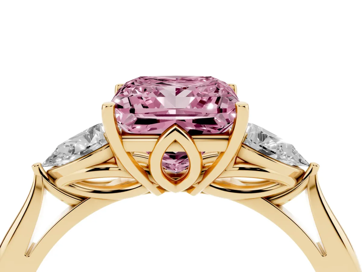 Fancy Pink Princess Cut Diamond Three-Stone Ring with Pear Side Stones and Prong Setting Yellow gold