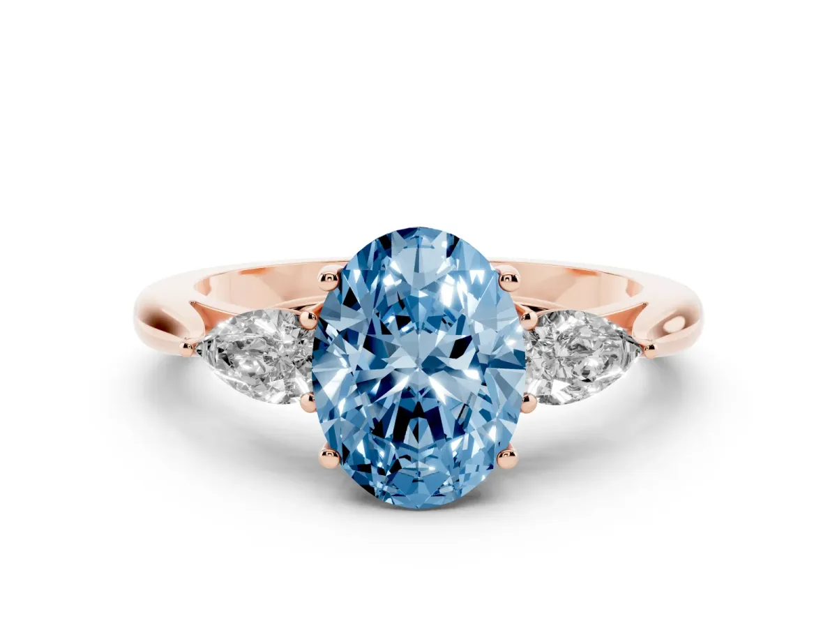 Fancy Blue Oval Cut Diamond Three-Stone Ring with Pear Side Stones and Prong Setting Rose gold