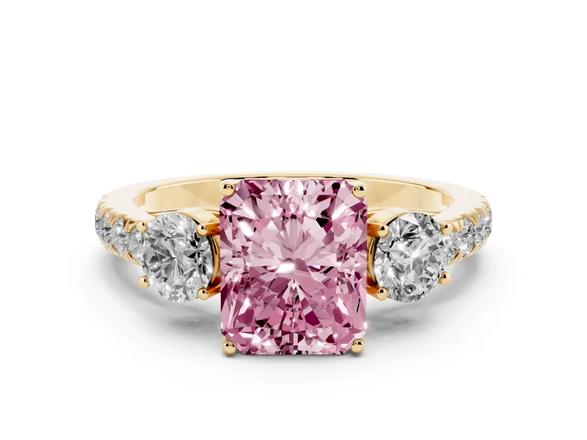 Fancy Pink Radiant Cut Cut Diamond Three-Stone Ring with Round Side Stones and Pavé Band Yellow gold