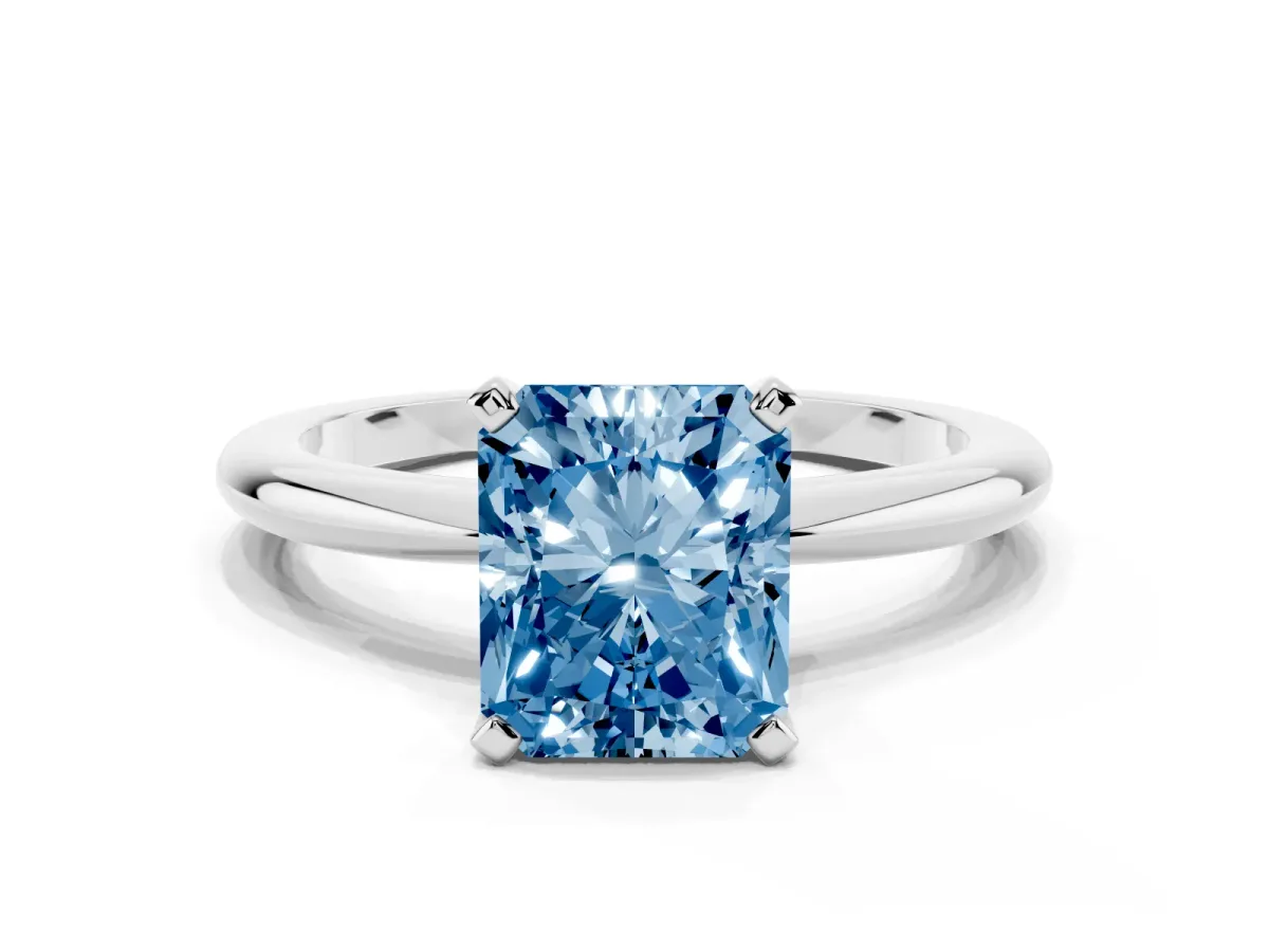 Fancy Blue Radiant Cut Diamond Solitaire Ring with Prong Setting and Classic Band Platinum