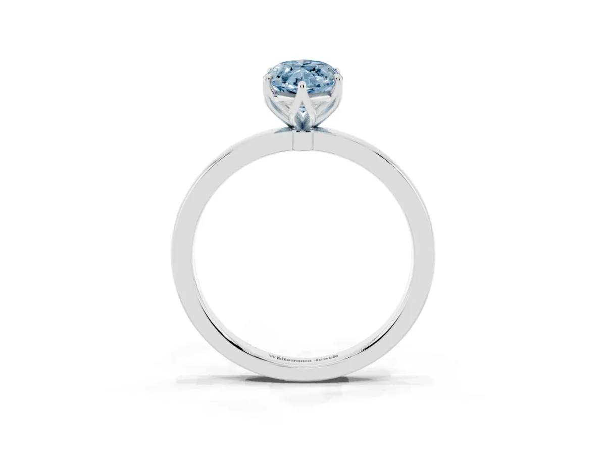 Fancy Blue Marquise Cut Diamond Solitaire Ring with Thin Band and Prong Setting Platinum
