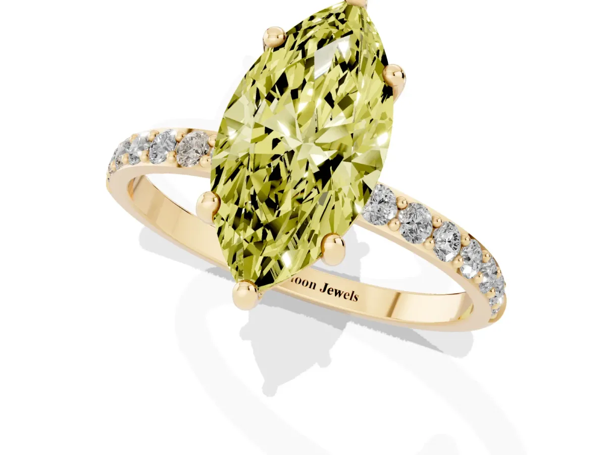 Fancy Yellow Marquise Cut Diamond Solitaire Ring with Round Pavé Band and Prong Setting Yellow gold