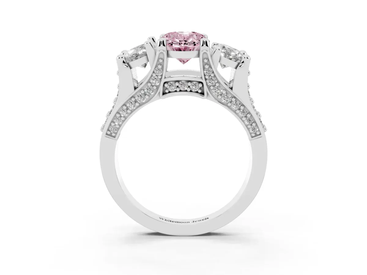 Fancy Pink Oval Cut Diamond Three-Stone Ring with Channel Set Band and Four-Prong Setting Silver