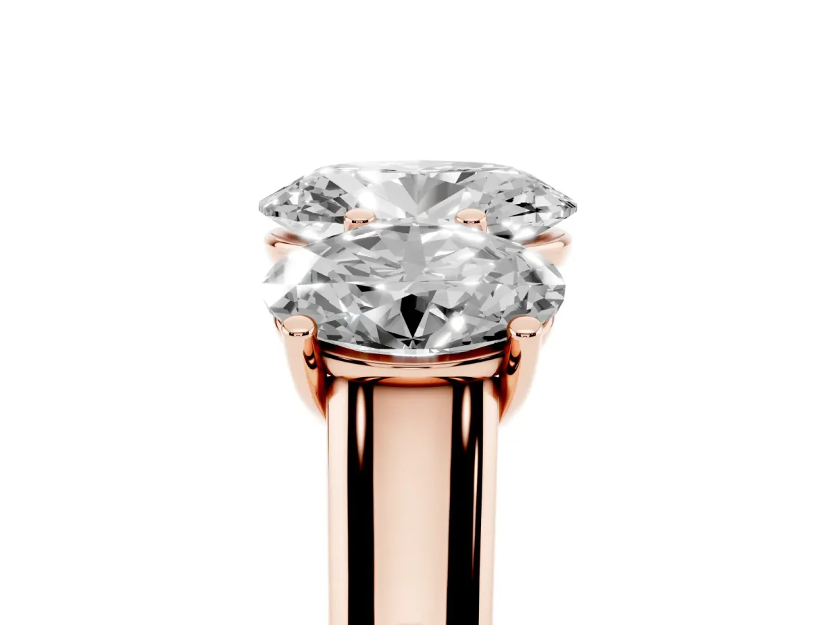 Oval Cut Three-Stone Diamond Ring with Prong Setting on a Classic Band Rose gold