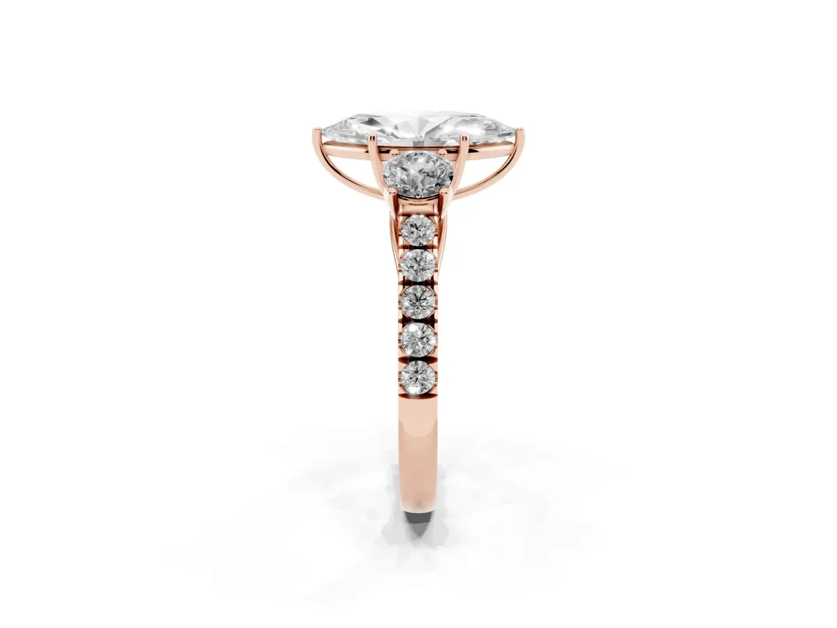 Marquise Cut Cut Diamond Three-Stone Ring with Round Side Stones and Pavé Band Rose gold